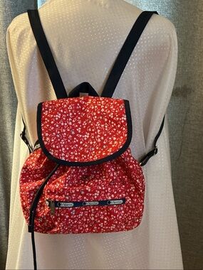 LeSportsac Red Floral Drawstring Backpack with Black Trim